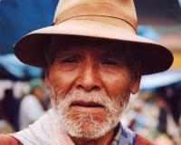Faces from the Pisac Market , Pisac, Cuzco, Peru